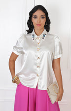 Blusa beige con aplicaciones