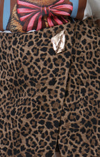 Falda short animal print con detalle dorado