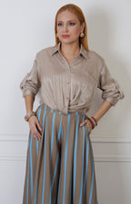 Blusa camisera con botones dorados
