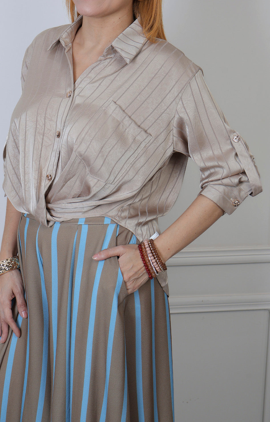 Blusa camisera con botones dorados