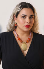 Set de collar con dije ovalado y aretes