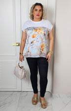Blusa con estampado floral y aves