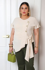 Blusa con lazo y botones dorados