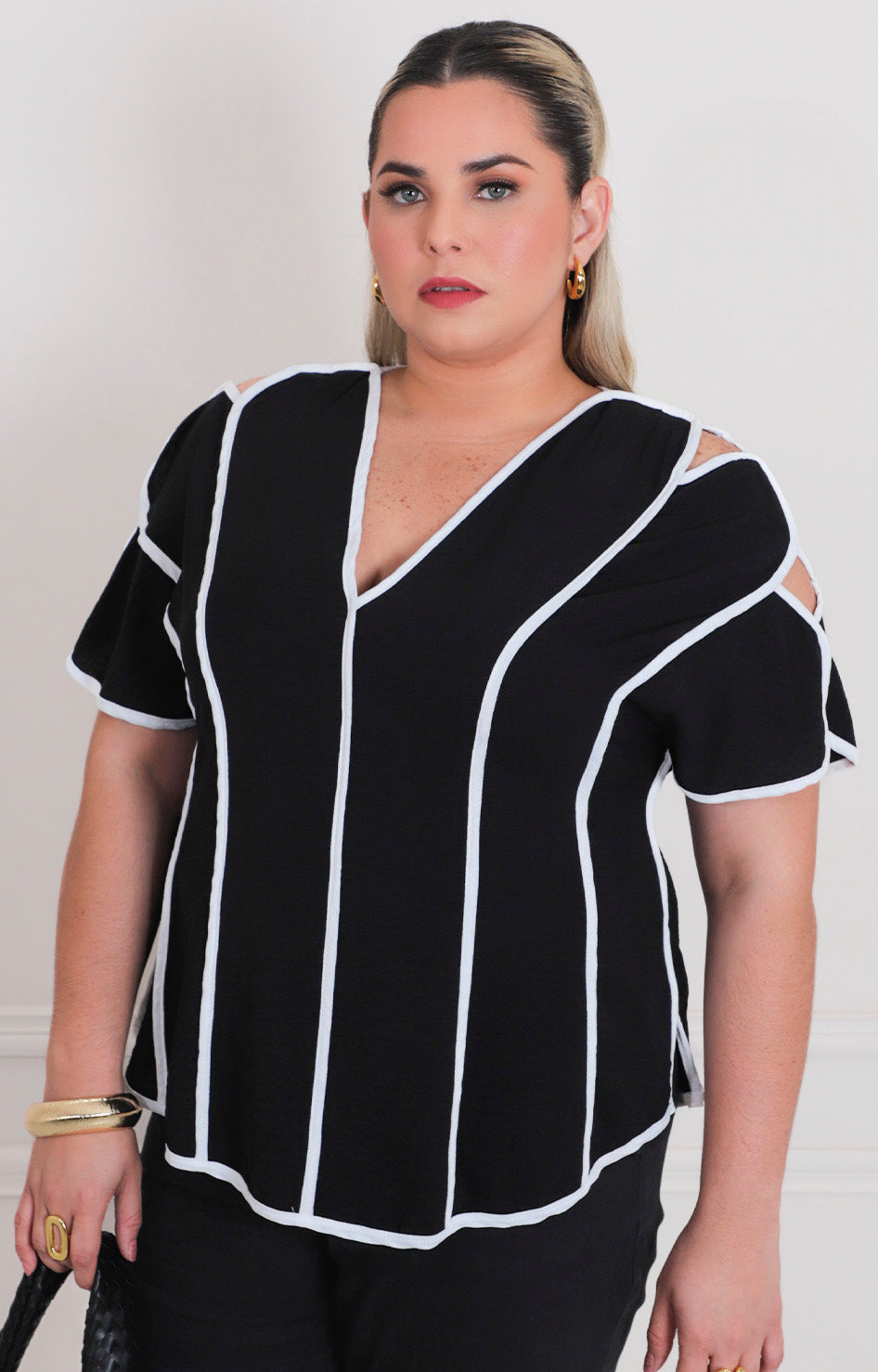 Blusa asimétrica con abertura