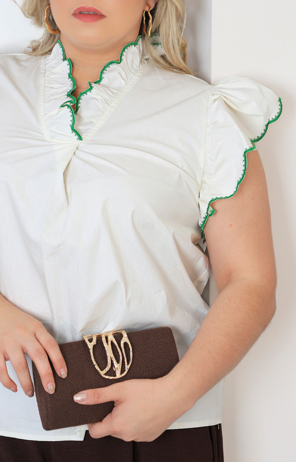 Blusa lisa con volante