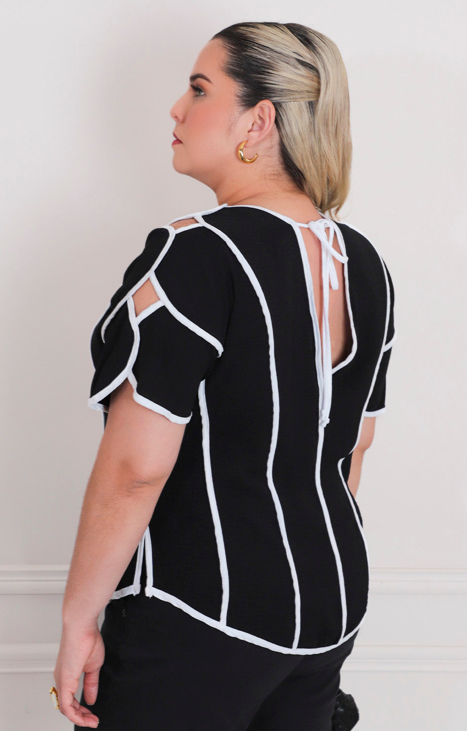Blusa asimétrica con abertura