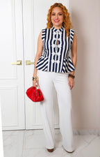 Blusa peplum de rayas con detalle bordado