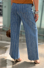 Pantalón de mezclilla con aplicaciones de brillos