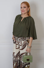Blusa con capa y escote en V