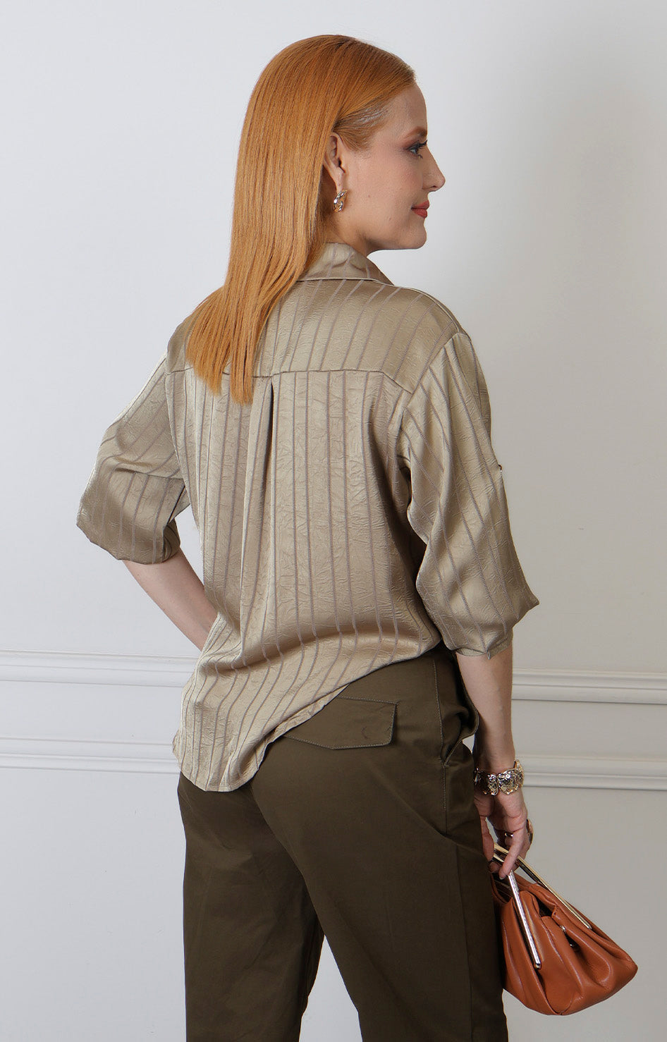 Blusa camisera con botones dorados