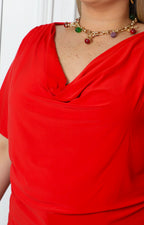 Blusa con escote drapeado