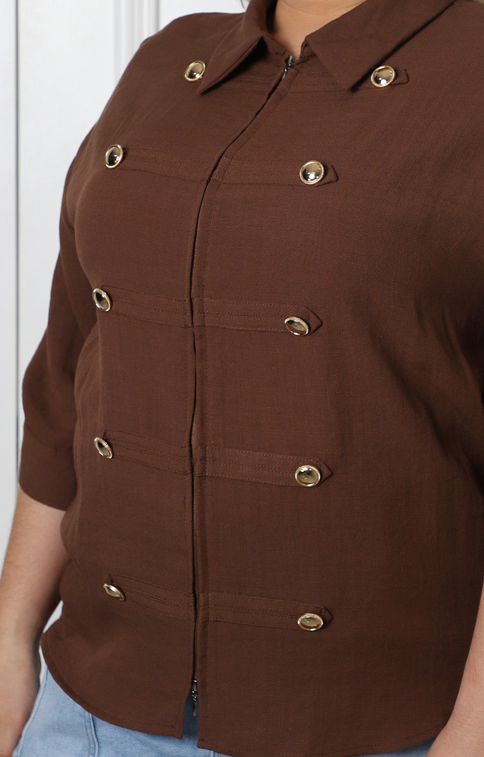 Blusa con botones dorados
