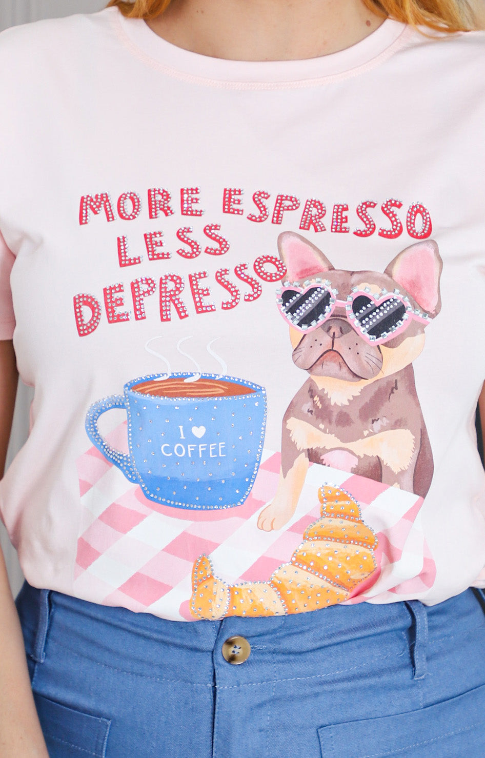 Blusa con estampado y aplicaciones de brillos