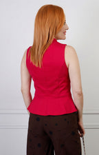 Blusa roja sin manga con cierres chinos