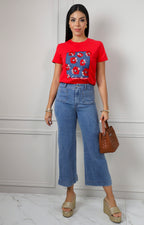 Blusa con estampado floral y aplicaciones