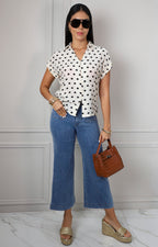 Blusa beige con lunares y manga corta