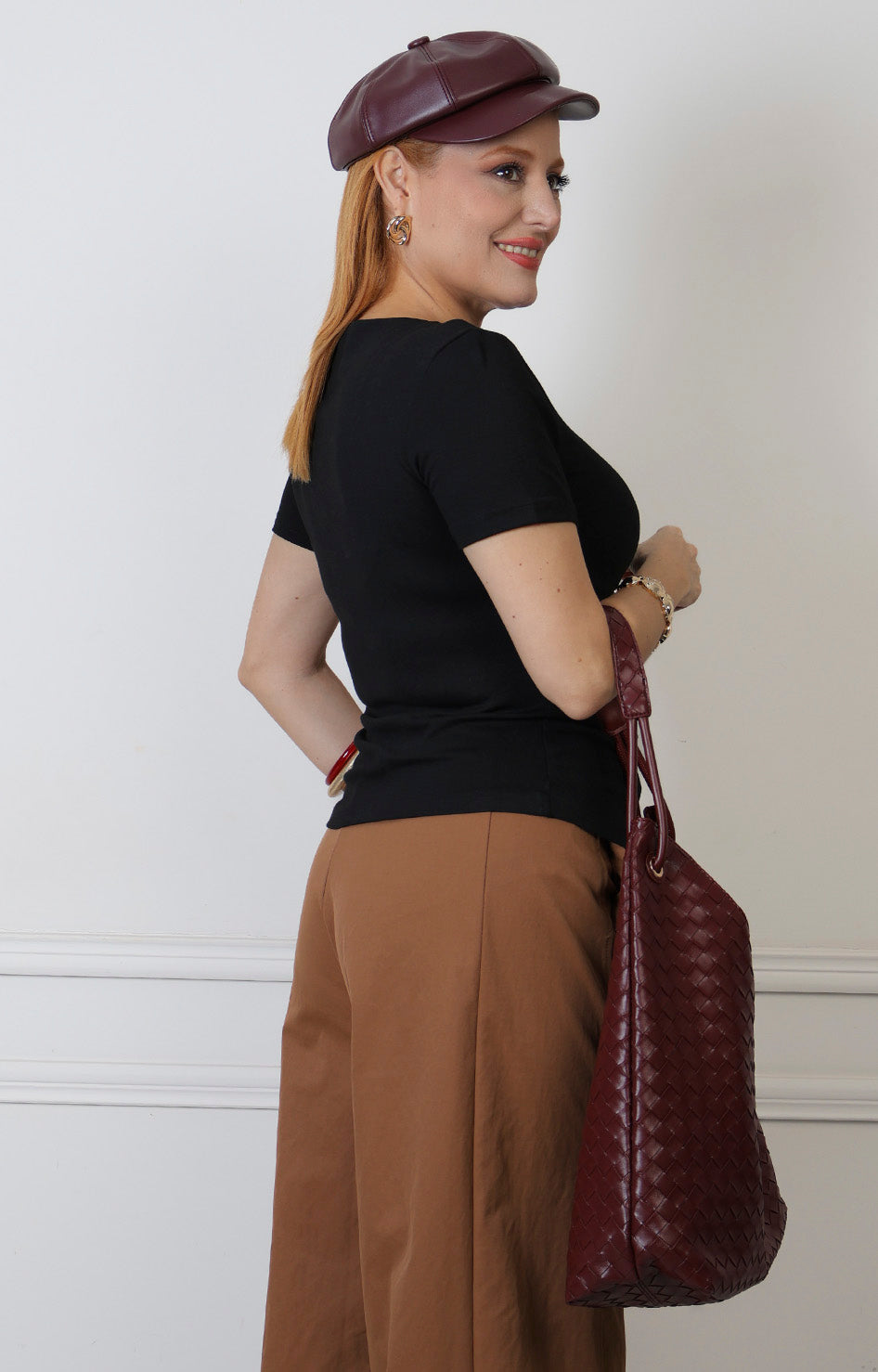 Blusa con nudo lateral y detalle dorado