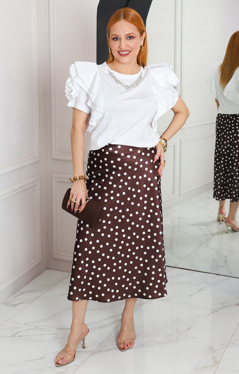 Blusa blanca con olanes y pedrería