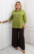 Blusa lisa con maxi botones