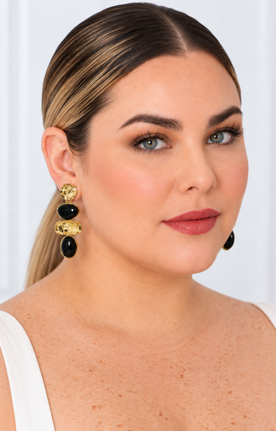 Aretes colgantes de cuentas