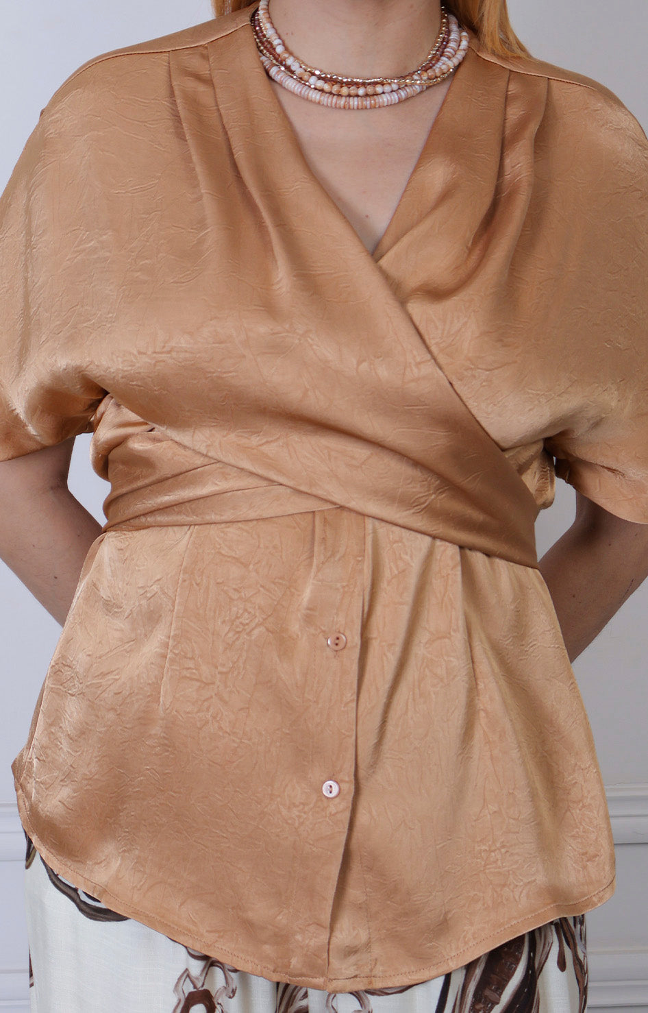 Blusa corto con cierre cruzado