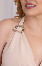 Palazzo beige con hebillas doradas