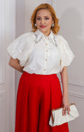 Blusa de manga globo bordada
