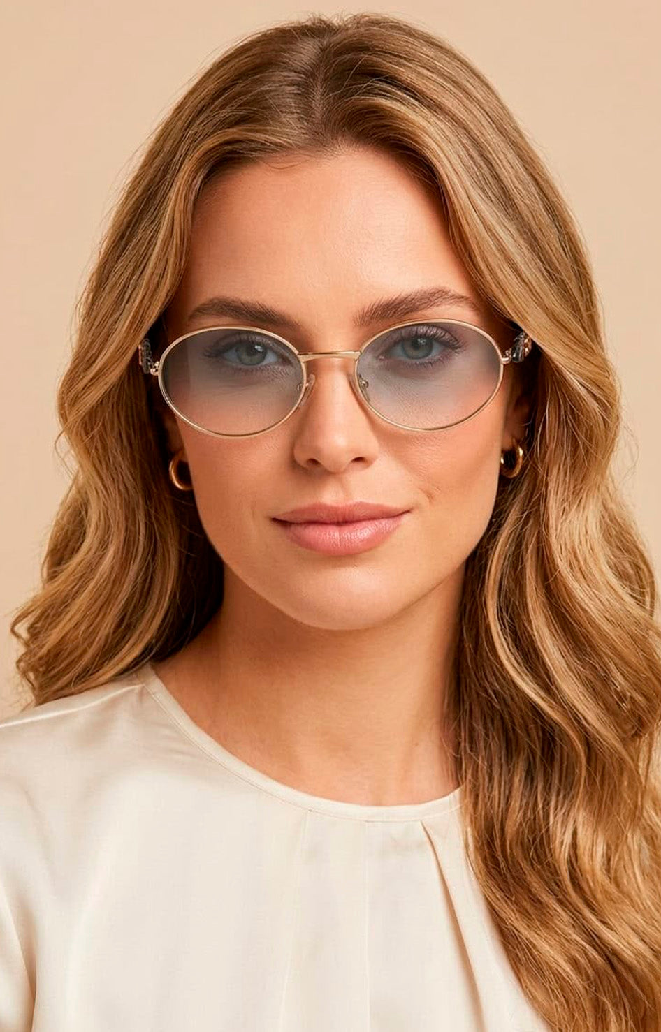 Lentes ovalados con detalle dorado
