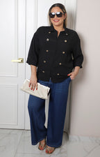 Blusa con botones dorados