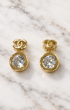Aretes dorados con cristal colgante