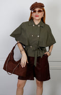 Blusa camisera blanca con cinturón de amarre