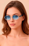 Lentes ovalados con detalle dorado