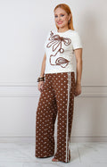 Conjunto regular Boutiquemirel con blusa blanca y pantalón de lunares