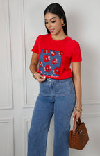 Blusa con estampado floral y aplicaciones