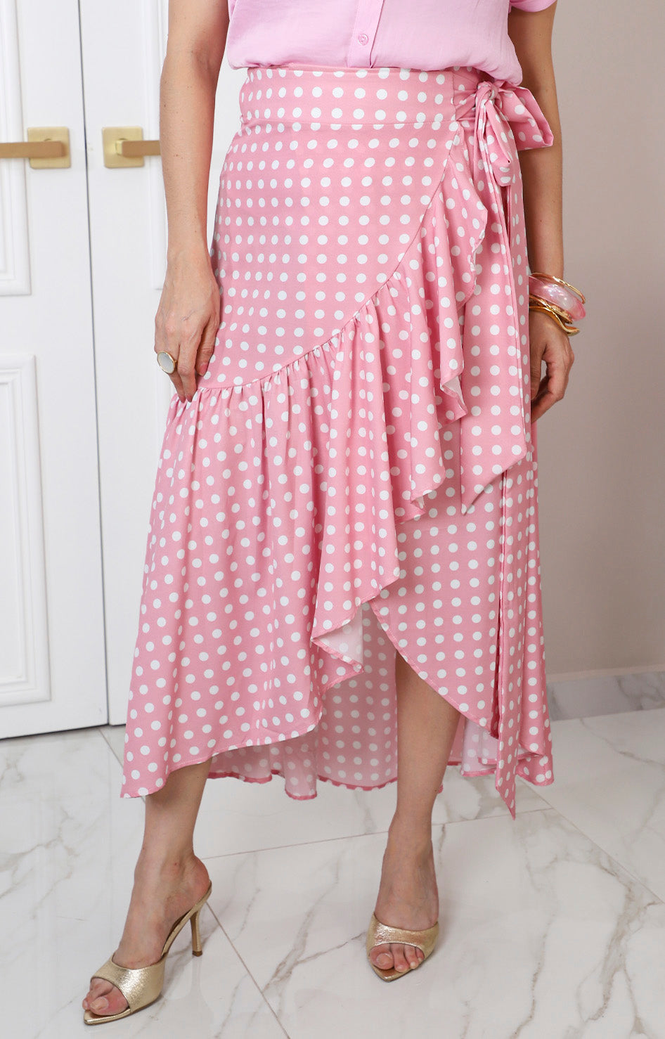 Falda rosa cruzada con olanes