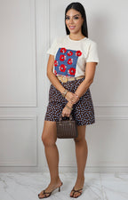 Blusa con estampado floral y aplicaciones