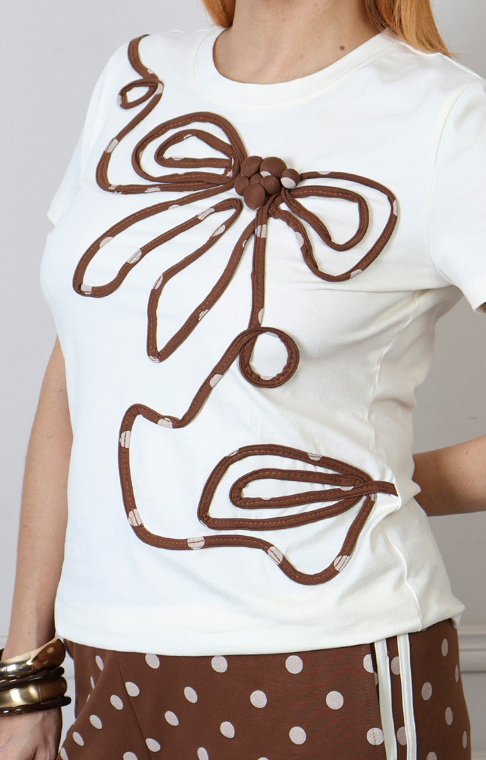 Conjunto Boutiquemirel de blusa blanca y pantalón de lunares