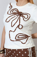 Conjunto Boutiquemirel de blusa blanca y pantalón de lunares