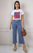 Blusa con estampado floral y aplicaciones