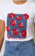 Blusa con estampado floral y aplicaciones