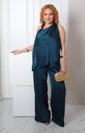 Conjunto verde drapeado con detalle dorado de la marca Boutiquemirel, ropa regular elegante y moderna.