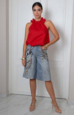 Blusa roja sin mangas con olán