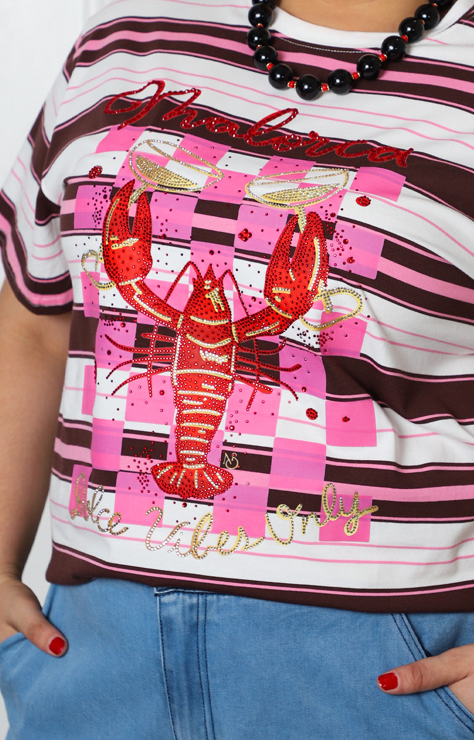 Blusa con aplicaciones brillantes