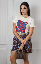 Blusa con estampado floral y aplicaciones