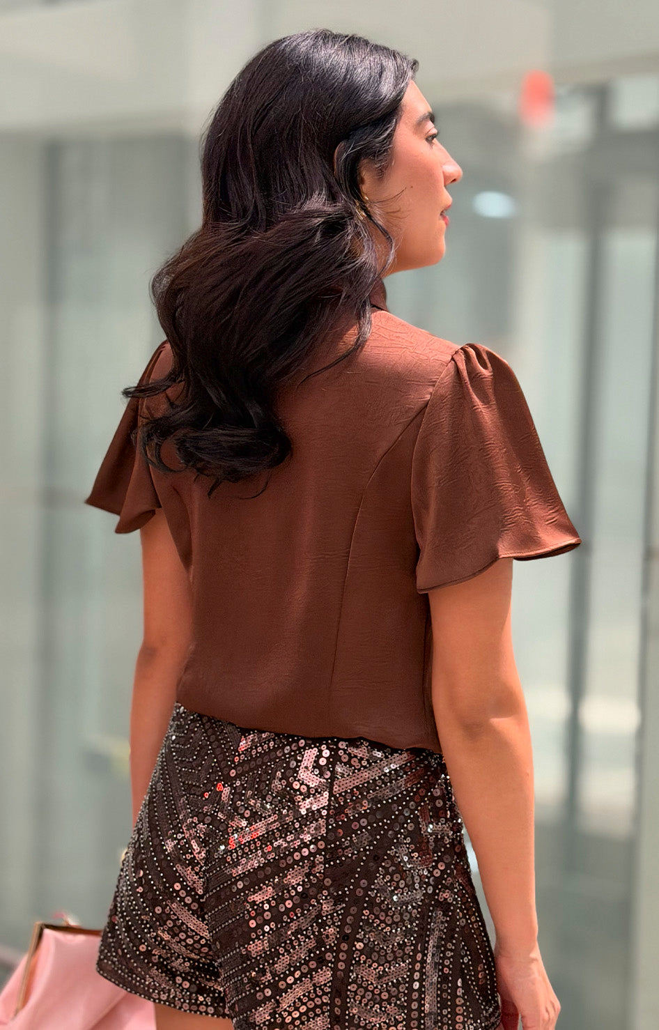 Blusa con lazo y botones de corazón