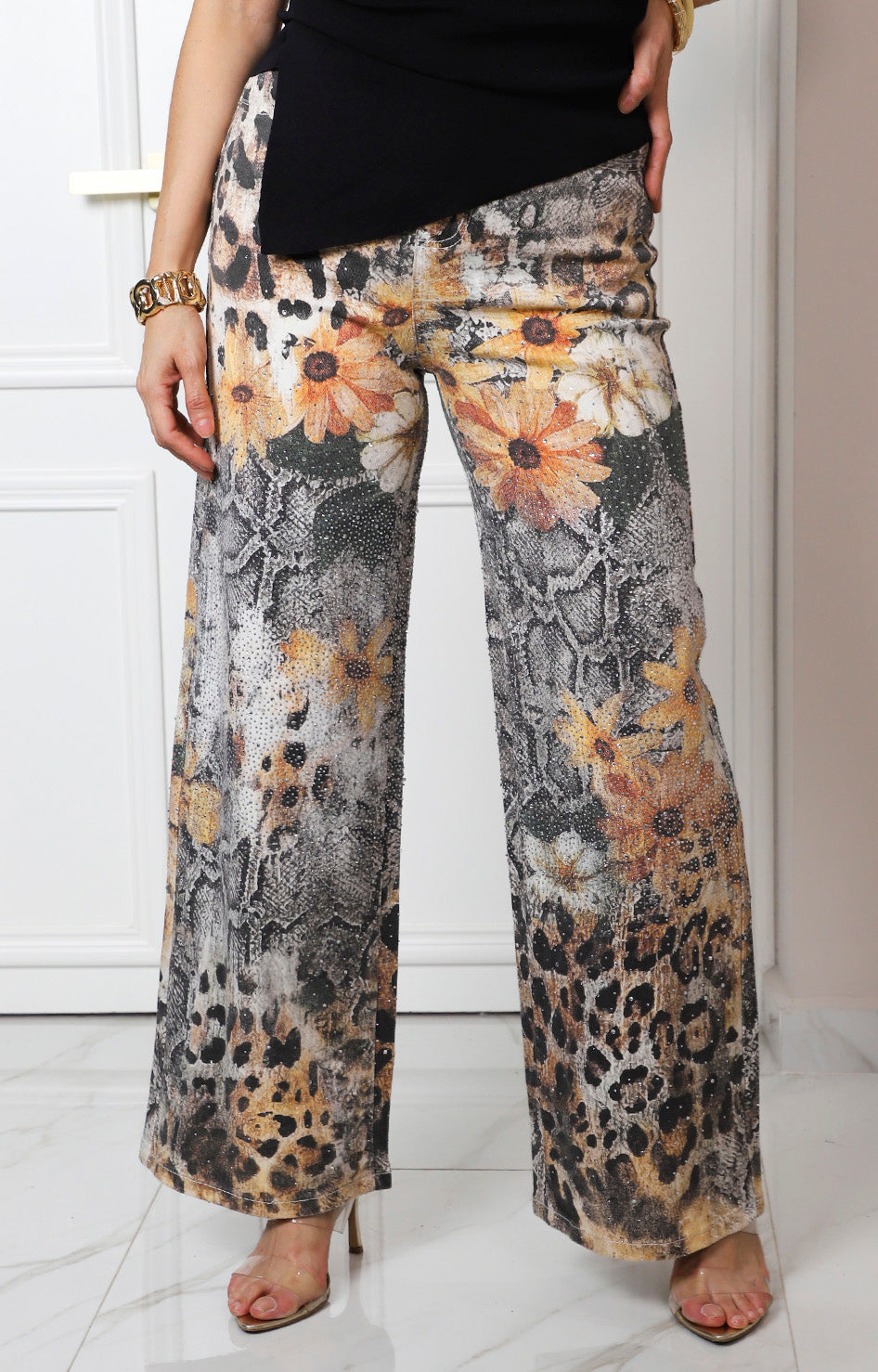 Pantalón con estampado floral y animal print