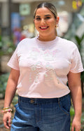 Blusa rosa bordada con aplicaciones