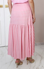 Falda rosa cruzada con olanes