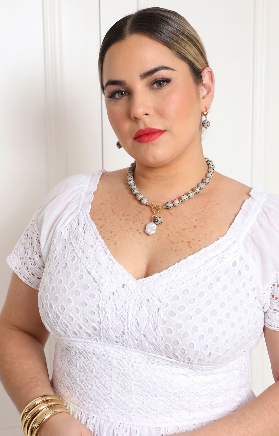 Set de collar y aretes con doble dije
