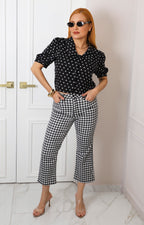 Blusa negra polka dots con manga globo
